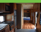 USED 2014 Cherokee Wolfpack 27' Toy Hauler RV